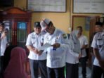 Penjabat_Bupati_Muaro_Jambi_Drs__Raden_Najmi_Meninjau_Pelayanan_Kantor_Kepala_Desa_Tebat_Patah